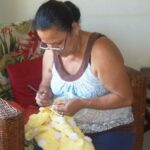 Rosa, our oldest knitter. She focuses on our wool-based blankets..